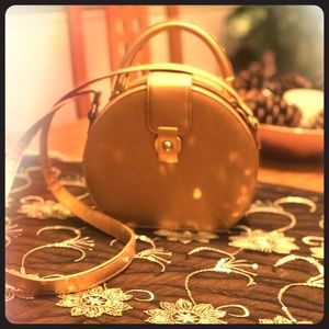 Gold cylinder purse